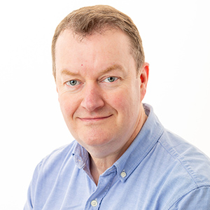 smallJackson-Tracy-Headshot-scaled